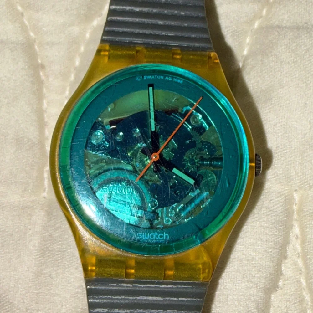 Vintage Swatch Yellow Case Teal Transparent Dial Analog Watch